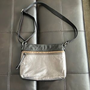 The Sak brand crossbody purse